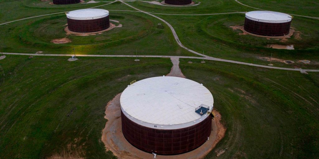 Oil prices settle lower as U.S. crude supplies mark first weekly rise in a month