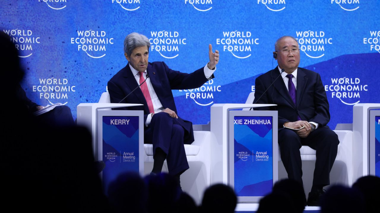 Kerry and Xie Zhenhua, left, China's special envoy for climate change, during a panel discussion at the World Economic Forum in Davos in 2022.