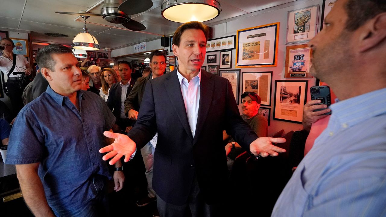 DeSantis speaks with patrons at a diner in Manchester, New Hampshire on May 19, 2023.