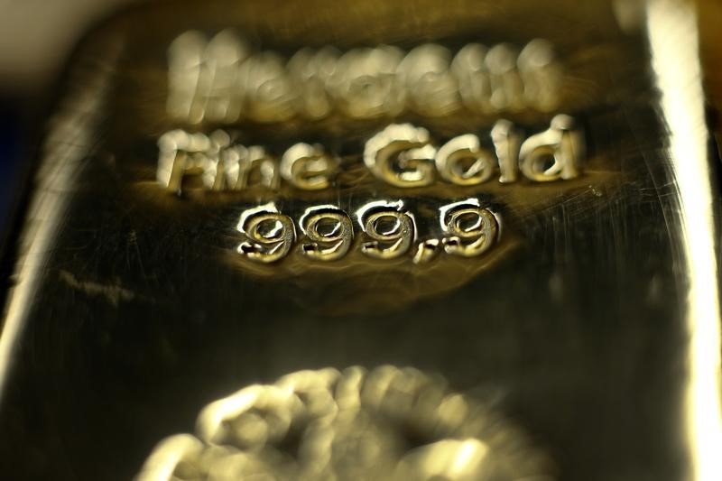 Gold prices dip as Fed pauses but flags future hikes