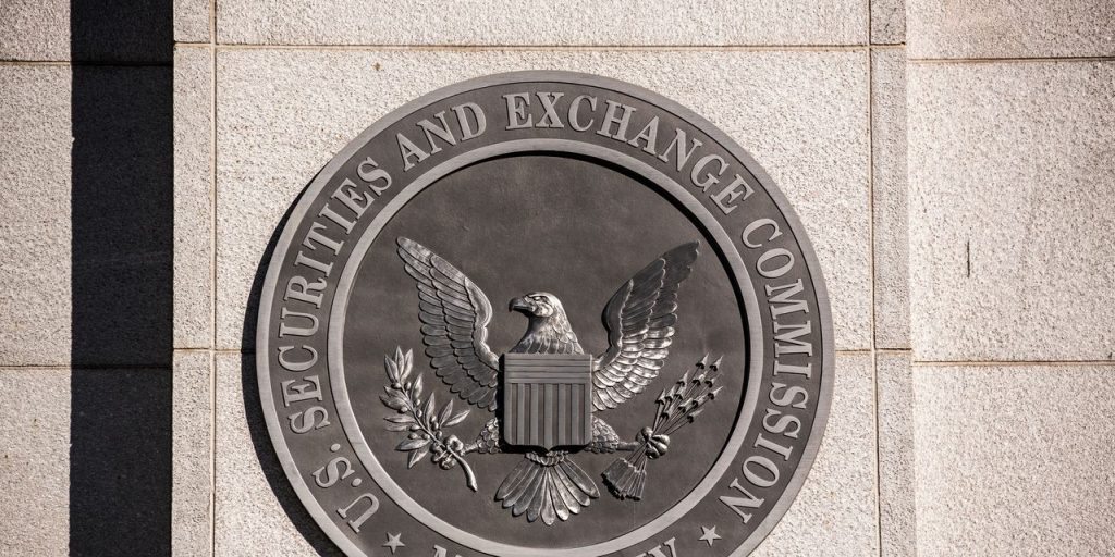 Former Olympian hit with second insider trading charge in a year