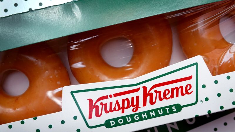 Krispy Kreme is giving away free boxes of donuts, but there’s a trick to getting them