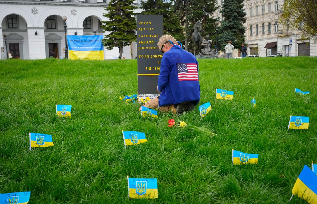 In this April 2022 photo, Ryan Wesley Routh pays tribute to foreign citizens killed during the Russia-Ukraine war in a central square in Kyiv.